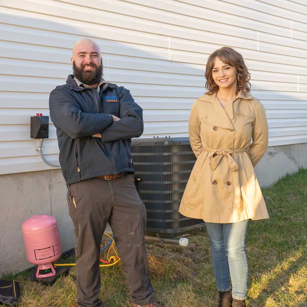 ac tech with a homeowner