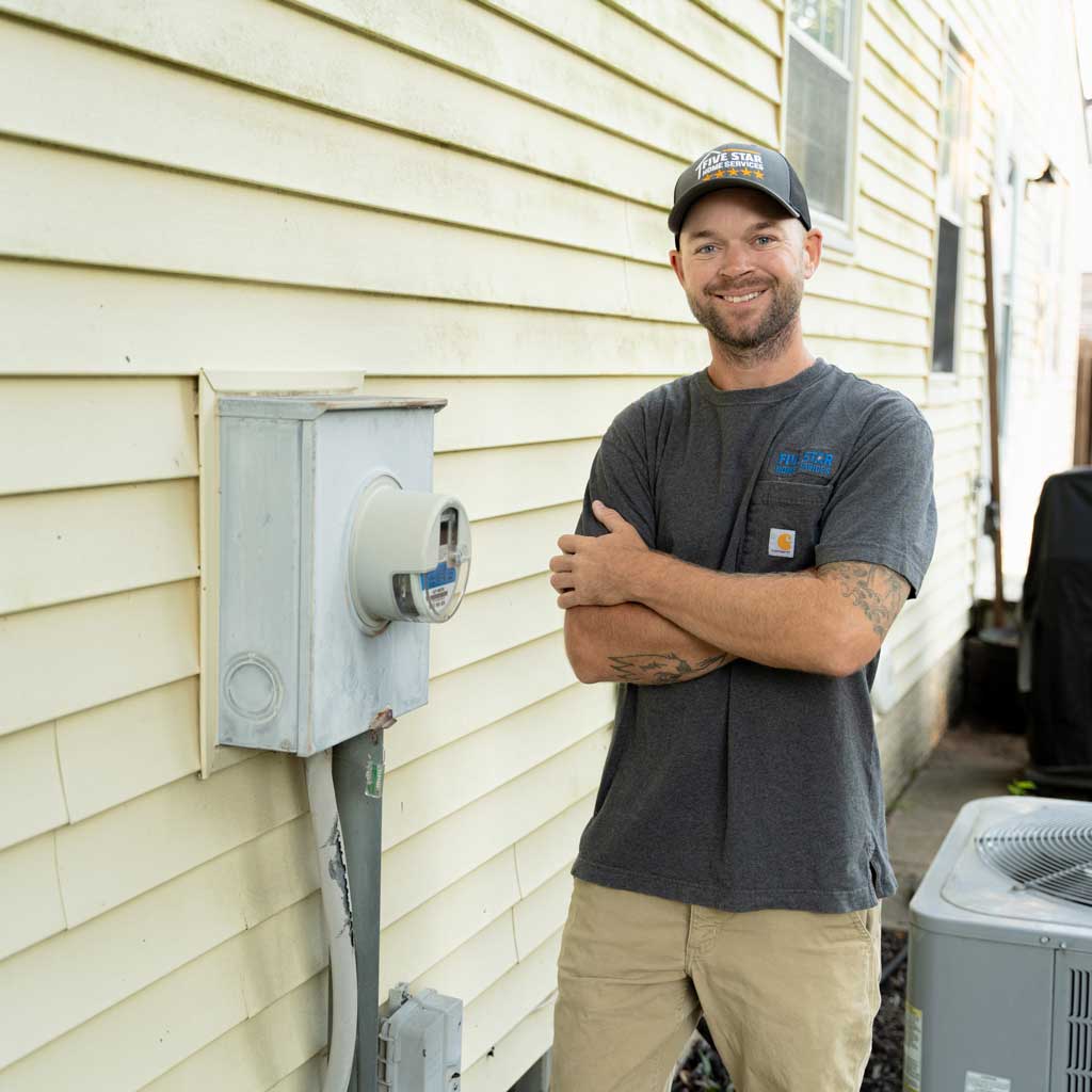 Electrical Services | Five Star Home Services tech with meter